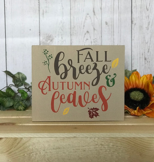 Measures 7 inch x 6 inch Painted in a burlap color. "Fall Breeze and Autumn Leaves" in brown and orange, with accent leaves in yellow, red and green.   Sits perfectly on a mantel, entry table or tiered tray. 
