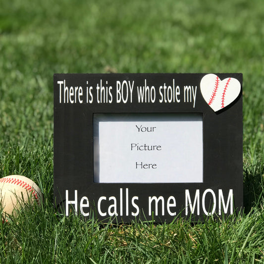 Wood frame Choose from 4x6 or 5x7 photo opening Frame painted in black. Saying "There is this Boy who stole my, Calls Me Mom" (grandma) all hand-painted on in white. Choose Mom or Grandma for saying. Wood heart accent painted like a baseball symbolizing "heart." Ready to hang and for desktop use.